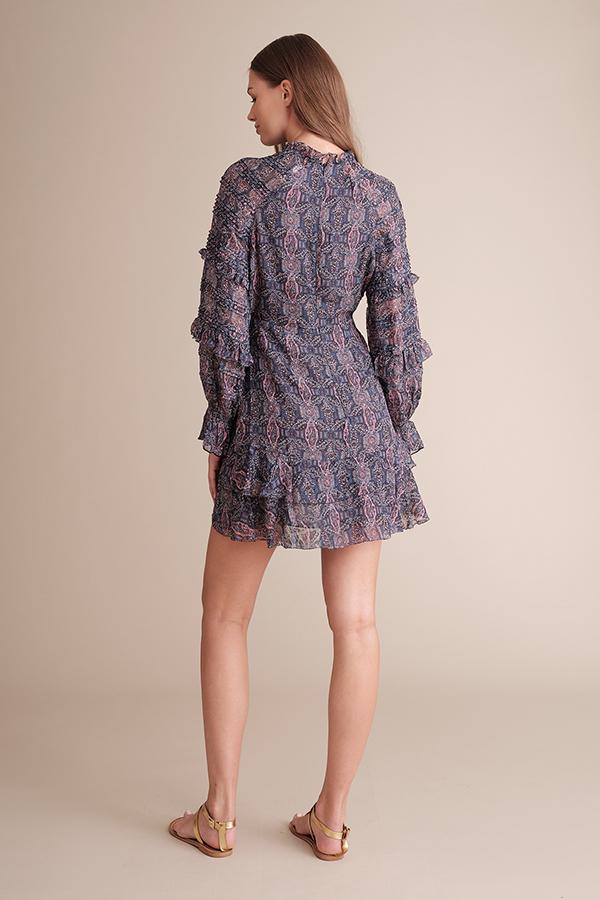Kenzie wrap front mini dress in silk chiffon with ruffle details and a kaleidoscope print, showcasing a stylish silhouette.