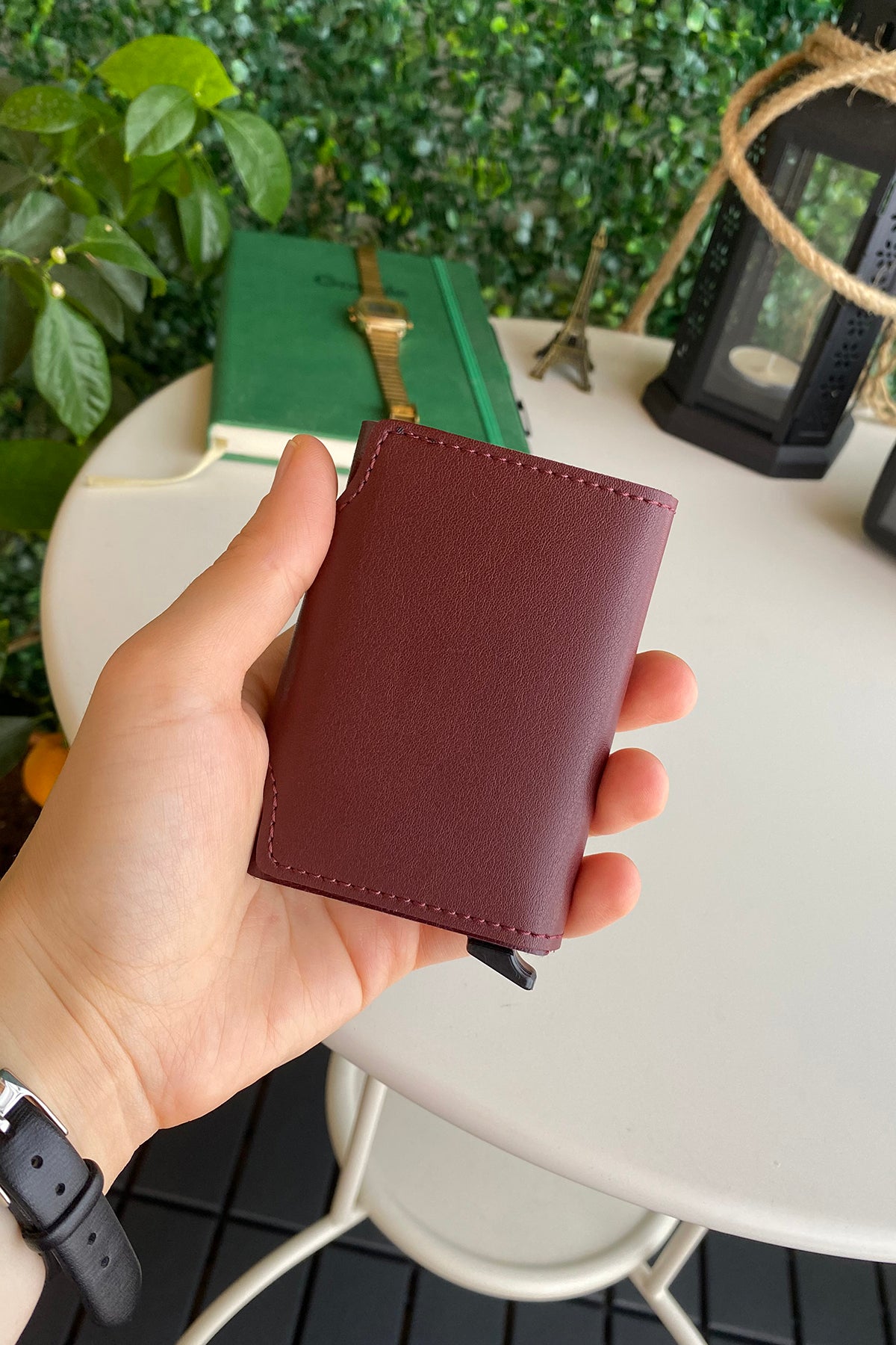 Konk Synthetic Leather RFID Protection Pop-up Cardholder in red, showcasing its sleek design and pop-up mechanism.