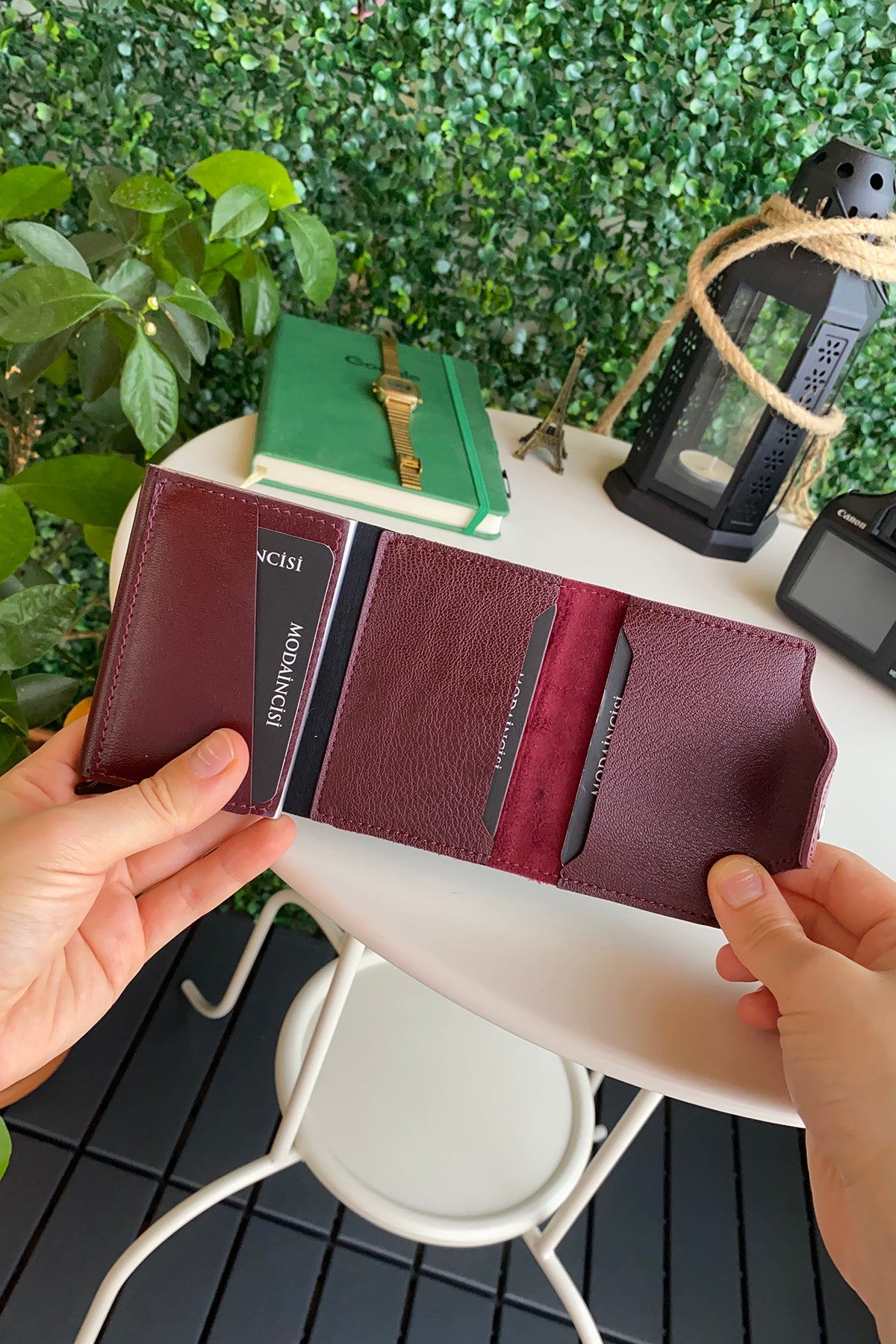 Konk Synthetic Leather RFID Protection Pop-up Cardholder in red, showcasing its sleek design and pop-up mechanism.