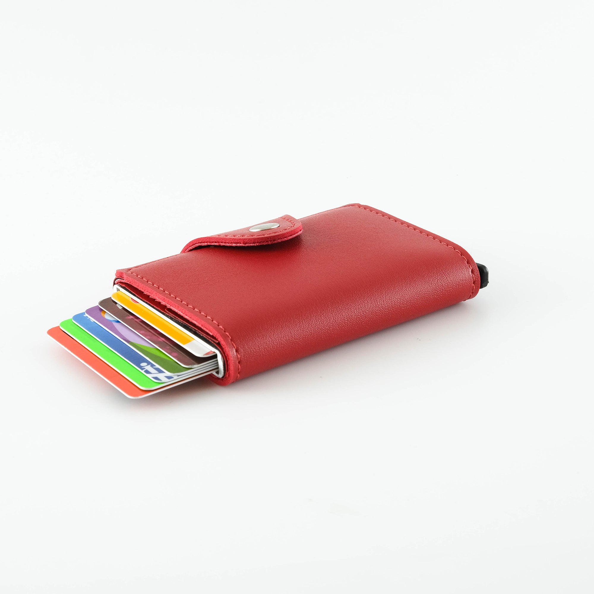 Konk Synthetic Leather RFID Protection Pop-up Cardholder in red, showcasing its sleek design and pop-up mechanism.