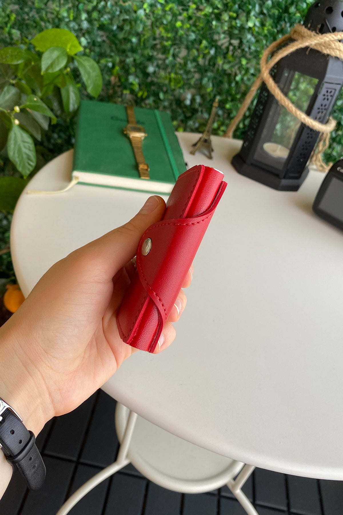 Konk Synthetic Leather RFID Protection Pop-up Cardholder in red, showcasing its sleek design and pop-up mechanism.