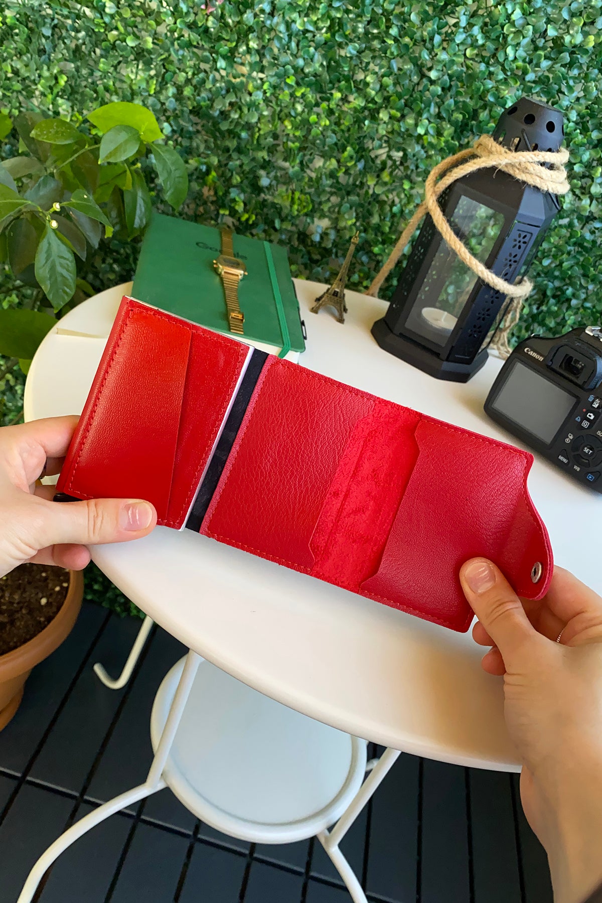 Konk Synthetic Leather RFID Protection Pop-up Cardholder in red, showcasing its sleek design and pop-up mechanism.