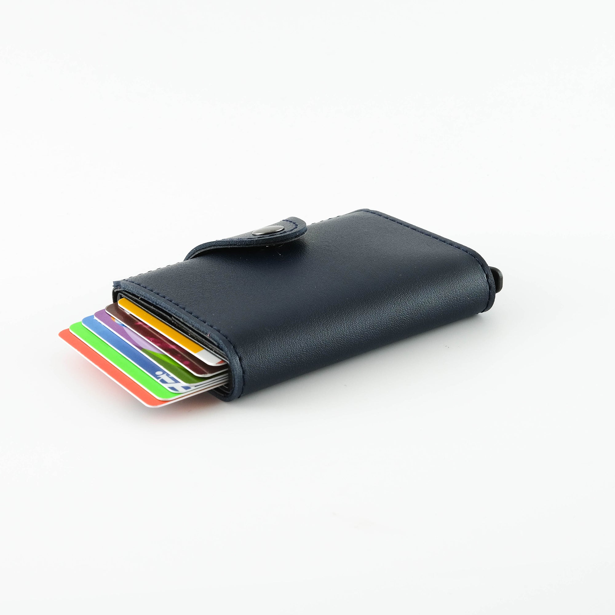 Konk Synthetic Leather RFID Protection Pop-up Cardholder in red, showcasing its sleek design and pop-up mechanism.