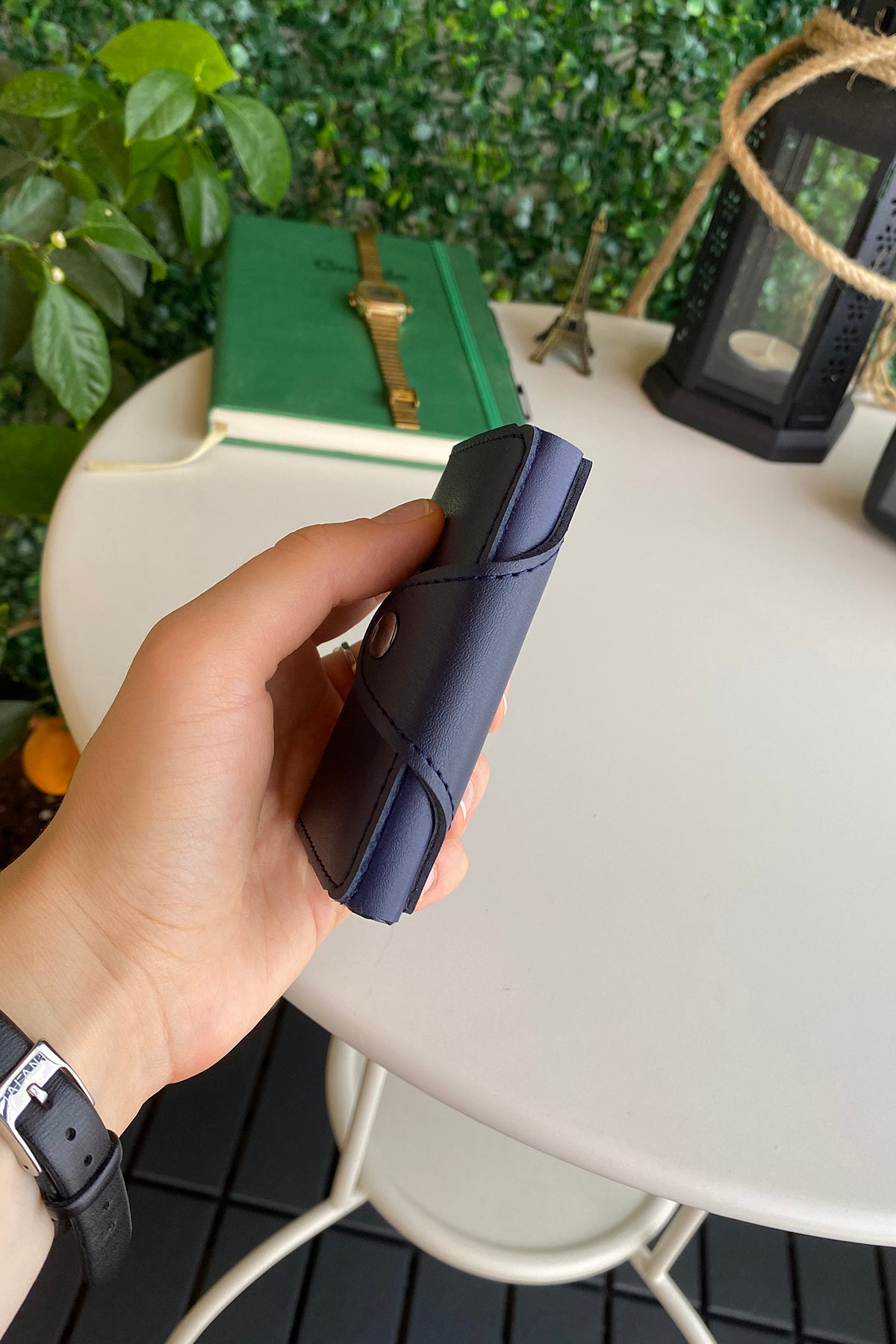 Konk Synthetic Leather RFID Protection Pop-up Cardholder in red, showcasing its sleek design and pop-up mechanism.