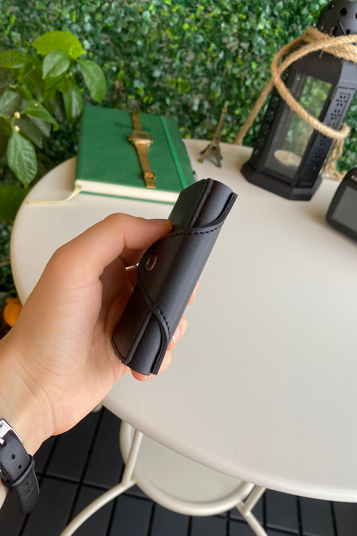 Konk Synthetic Leather RFID Protection Pop-up Cardholder in red, showcasing its sleek design and pop-up mechanism.