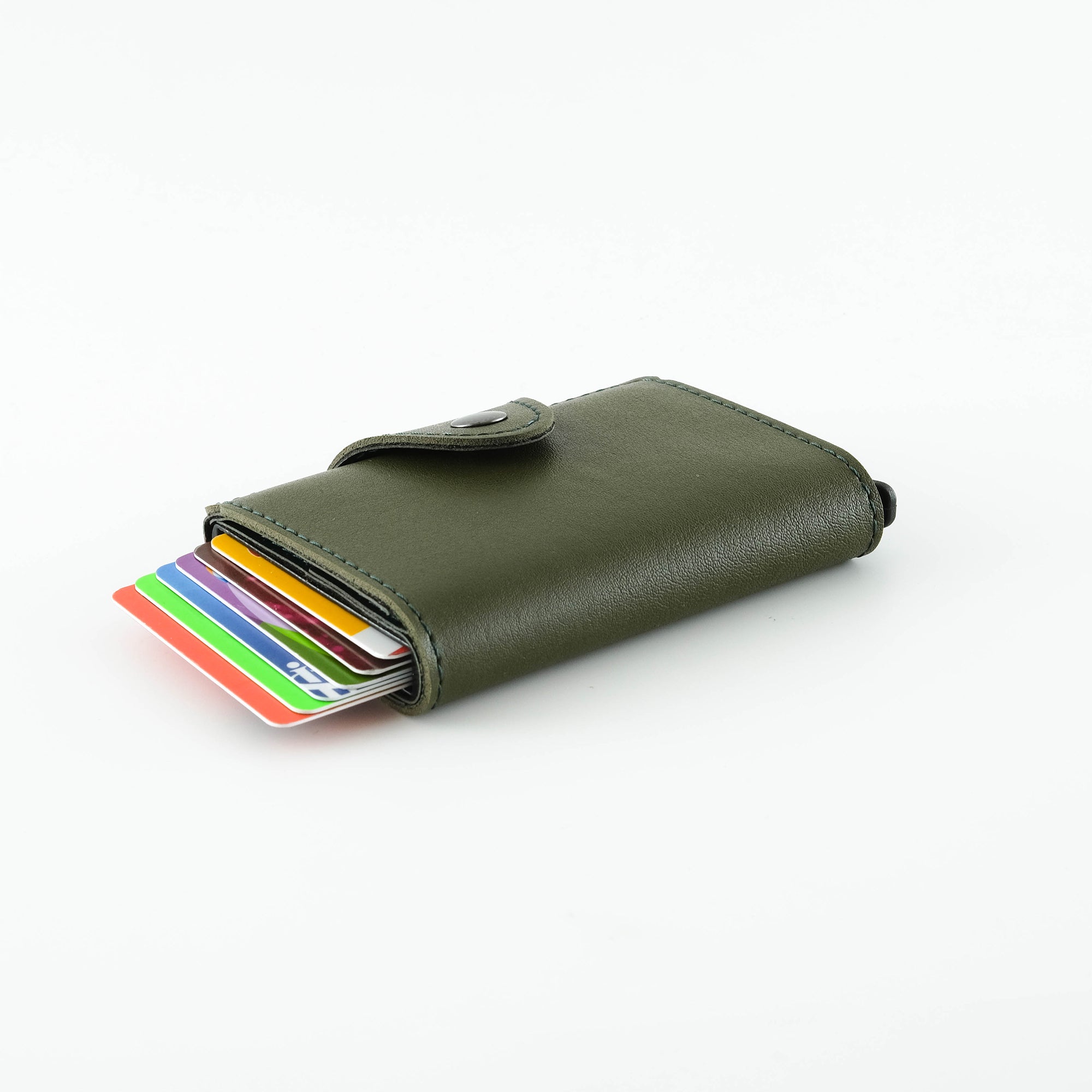 Konk Synthetic Leather RFID Protection Pop-up Cardholder in red, showcasing its sleek design and pop-up mechanism.