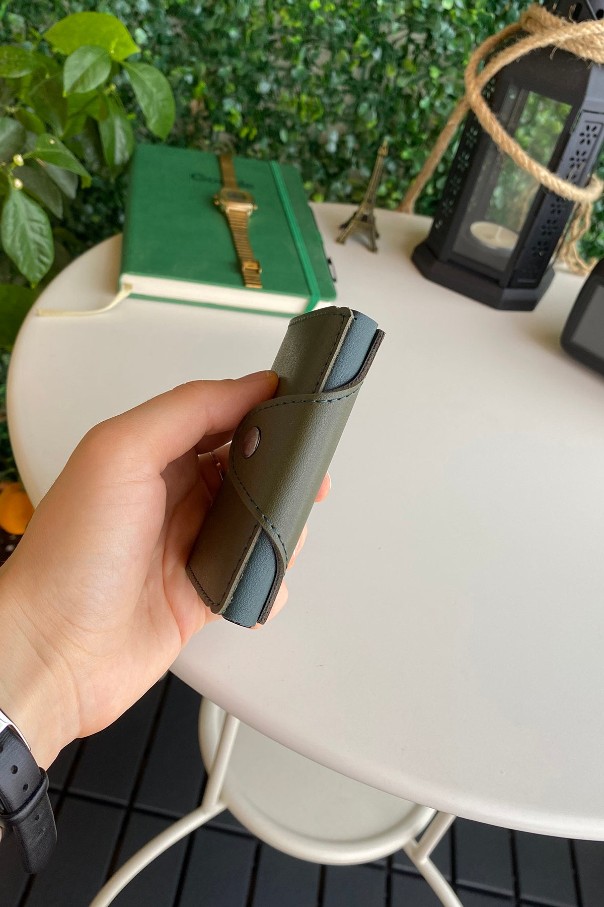 Konk Synthetic Leather RFID Protection Pop-up Cardholder in red, showcasing its sleek design and pop-up mechanism.