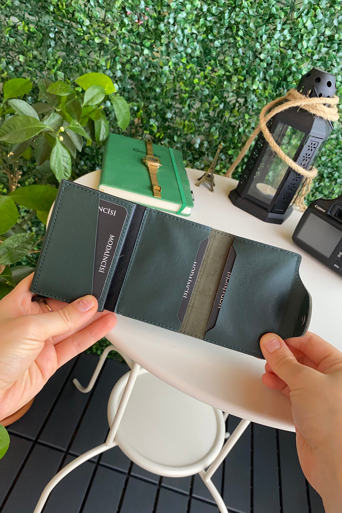 Konk Synthetic Leather RFID Protection Pop-up Cardholder in red, showcasing its sleek design and pop-up mechanism.