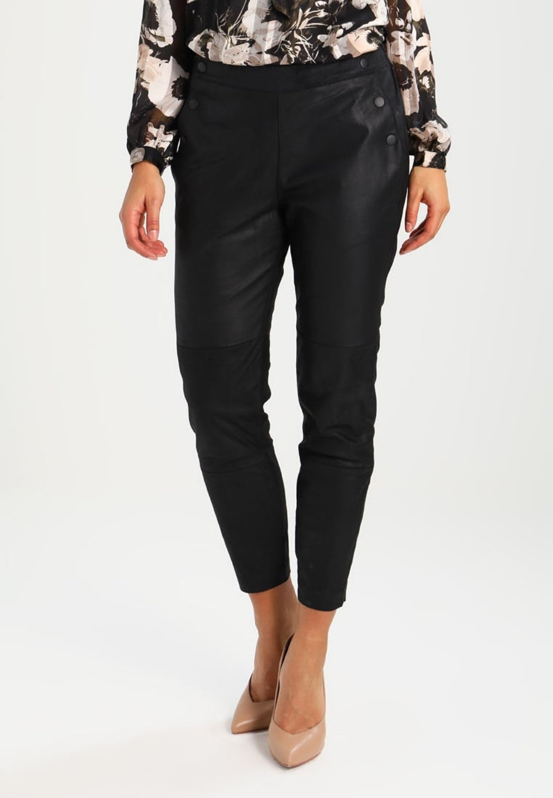 Koza Leathers Women's Real Lambskin Leather Capri Pant WP058 displayed elegantly, showcasing its soft texture and stylish design.