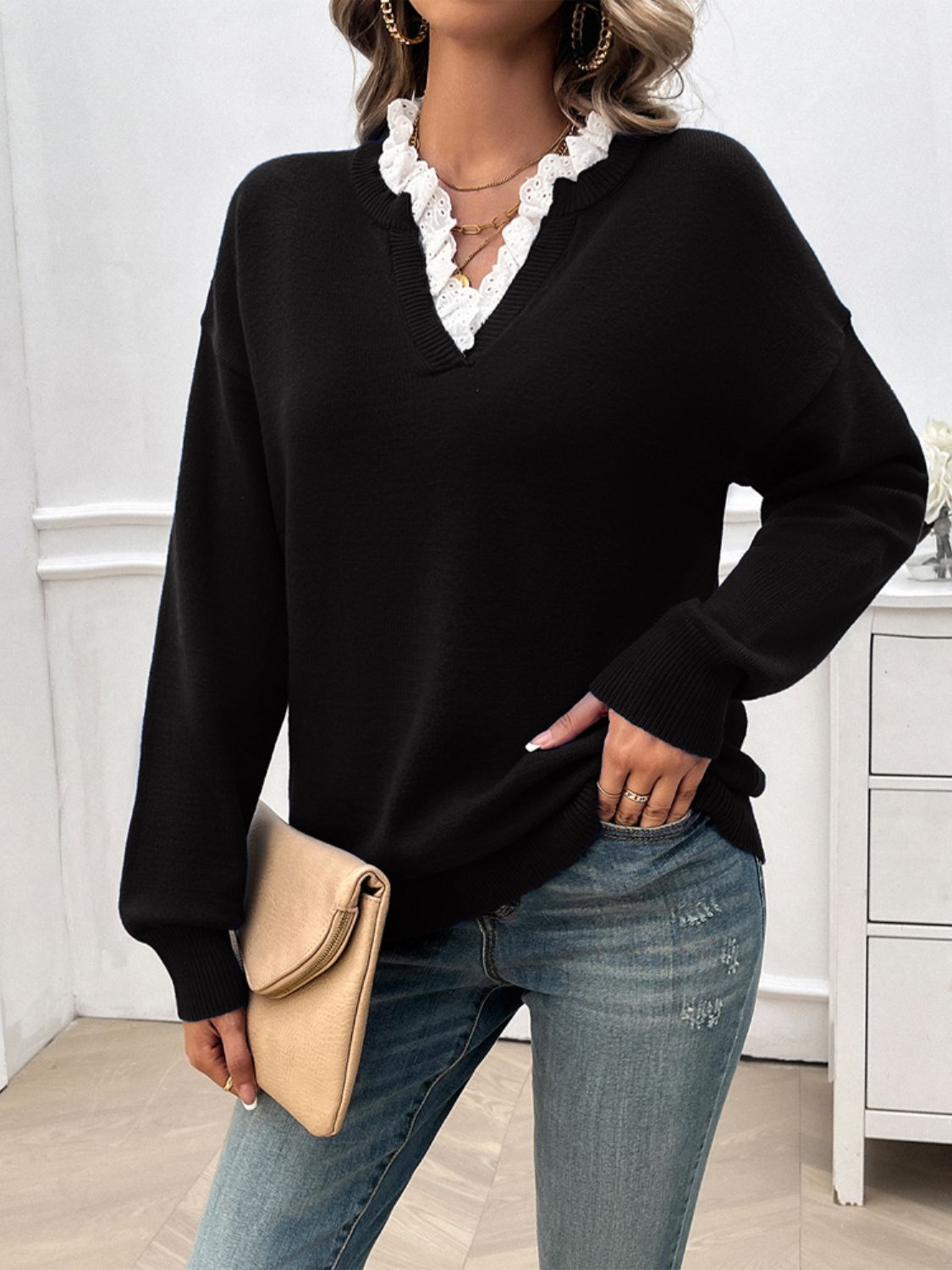 Lace Detail Notched Long Sleeve Sweater in a soft fabric blend, featuring elegant lace accents and a stylish notched neckline.