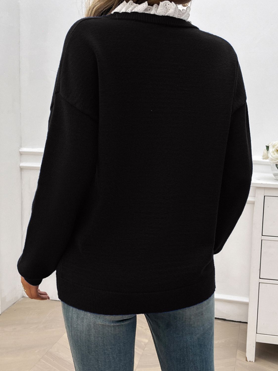 Lace Detail Notched Long Sleeve Sweater in a soft fabric blend, featuring elegant lace accents and a stylish notched neckline.