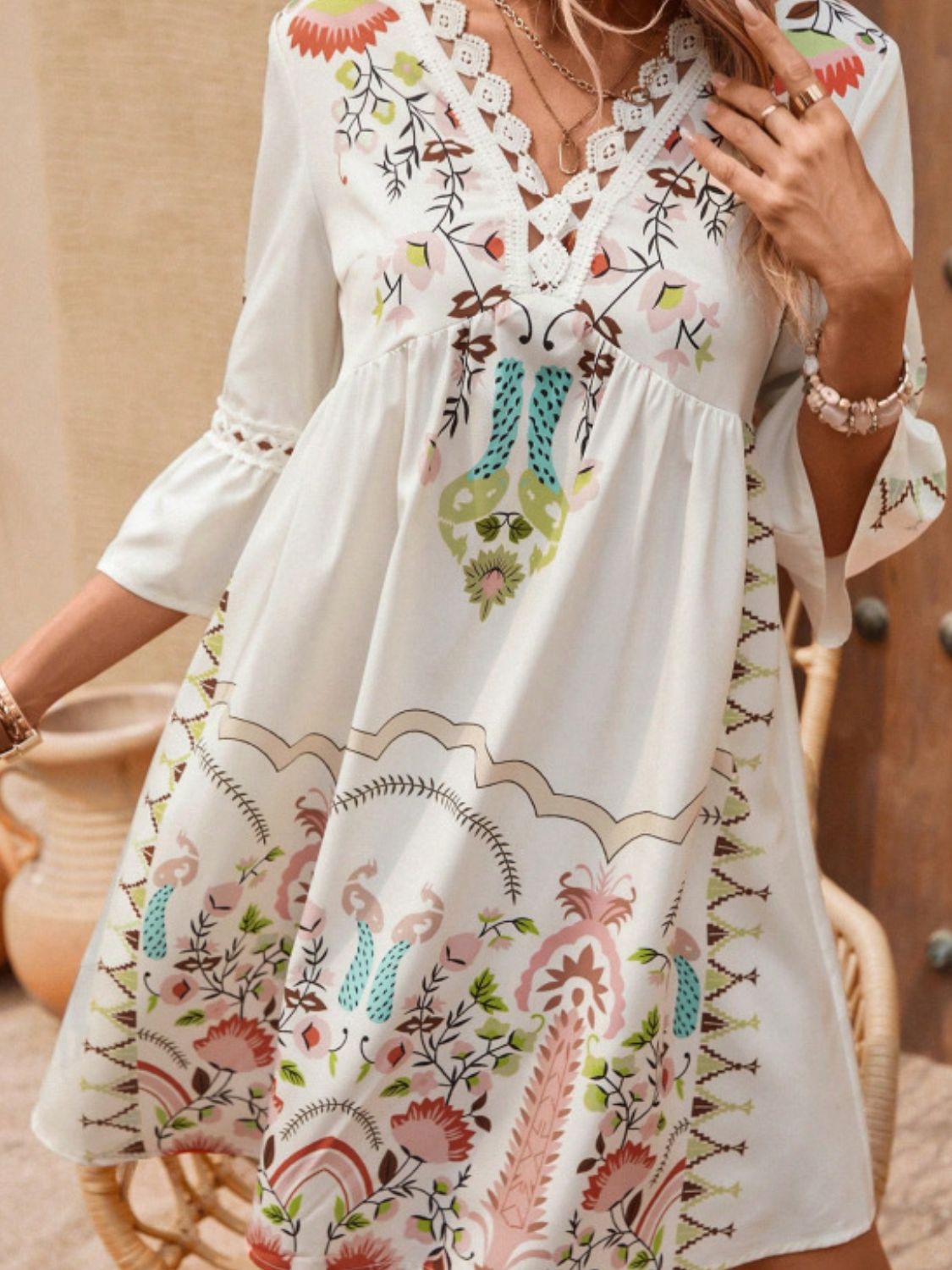 Lace Detail Printed Three-Quarter Sleeve Dress featuring elegant lace accents and semi-sheer fabric, perfect for stylish occasions.