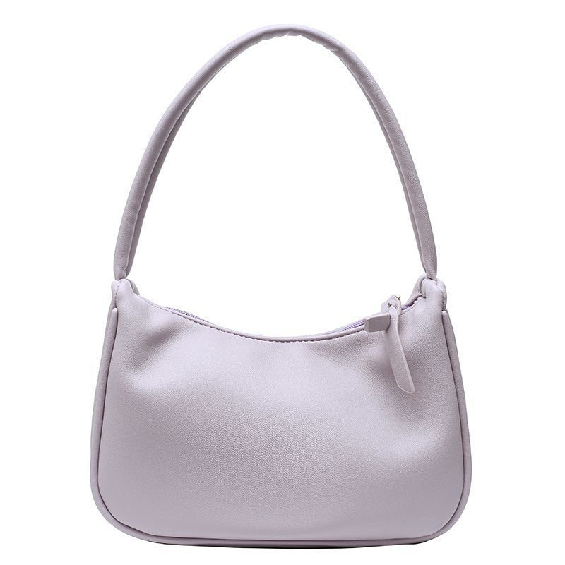 Ladies PU Leather Single-shoulder Bag in candy color, featuring a soft surface and zipper opening, perfect for everyday use.