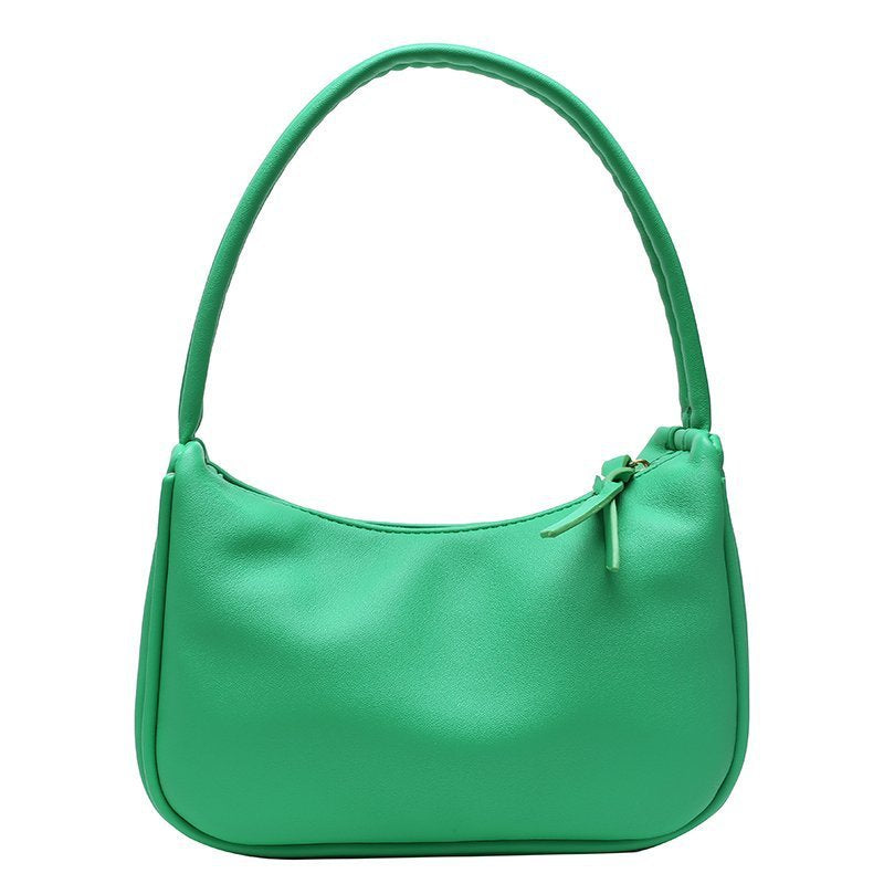 Ladies PU Leather Single-shoulder Bag in candy color, featuring a soft surface and zipper opening, perfect for everyday use.