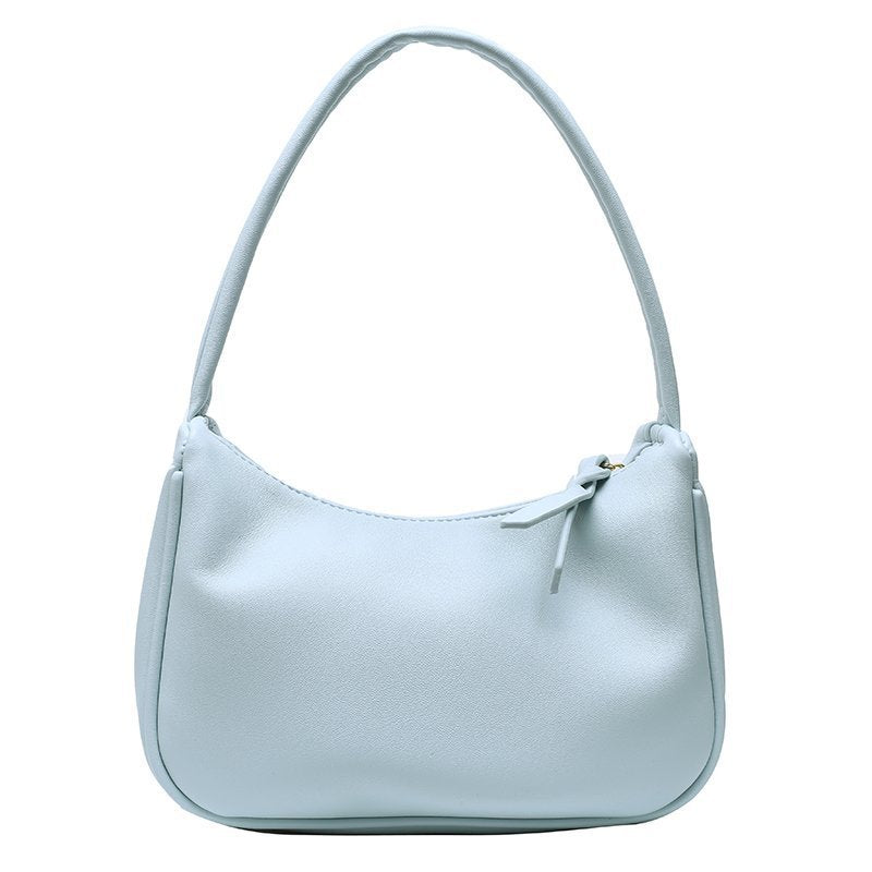 Ladies PU Leather Single-shoulder Bag in candy color, featuring a soft surface and zipper opening, perfect for everyday use.