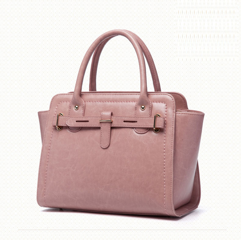 Elegant ladies quality fashion handbag made from two-layer cowhide leather, featuring a soft handle and leather lining, perfect for daily occasions.