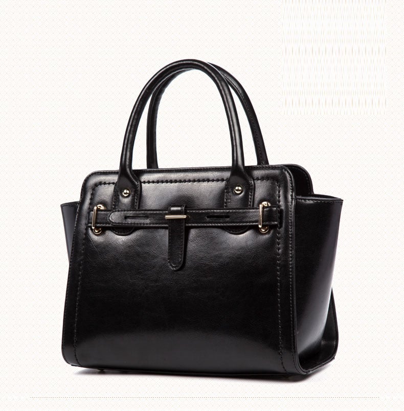 Elegant ladies quality fashion handbag made from two-layer cowhide leather, featuring a soft handle and leather lining, perfect for daily occasions.