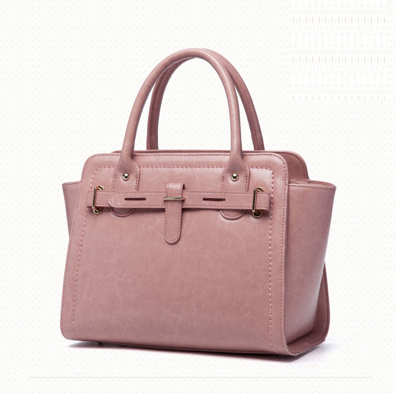 Elegant ladies quality fashion handbag made from two-layer cowhide leather, featuring a soft handle and leather lining, perfect for daily occasions.
