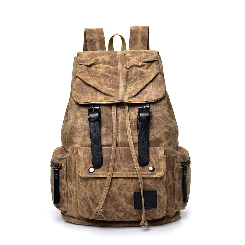 Large Capacity Men's Canvas Bag in solid color, designed for outdoor tourism with multiple pockets and comfortable shoulder straps.