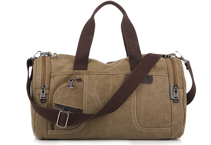 Large-capacity canvas duffel bag designed for hiking and tourism, featuring multiple pockets and a durable structure.