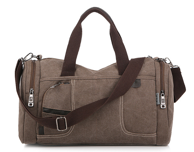 Large-capacity canvas duffel bag designed for hiking and tourism, featuring multiple pockets and a durable structure.