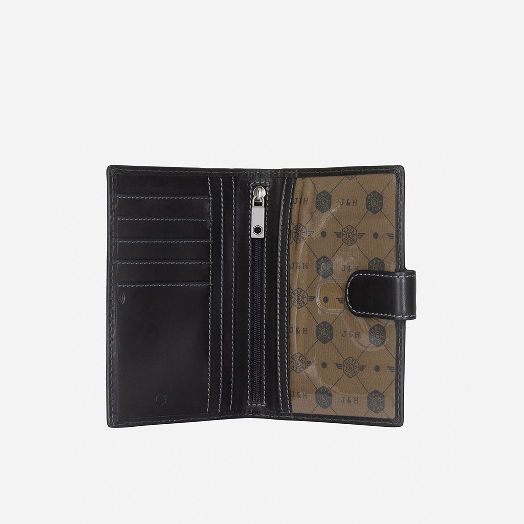 Black leather RFID passport cover with sleek design, protecting travel documents.