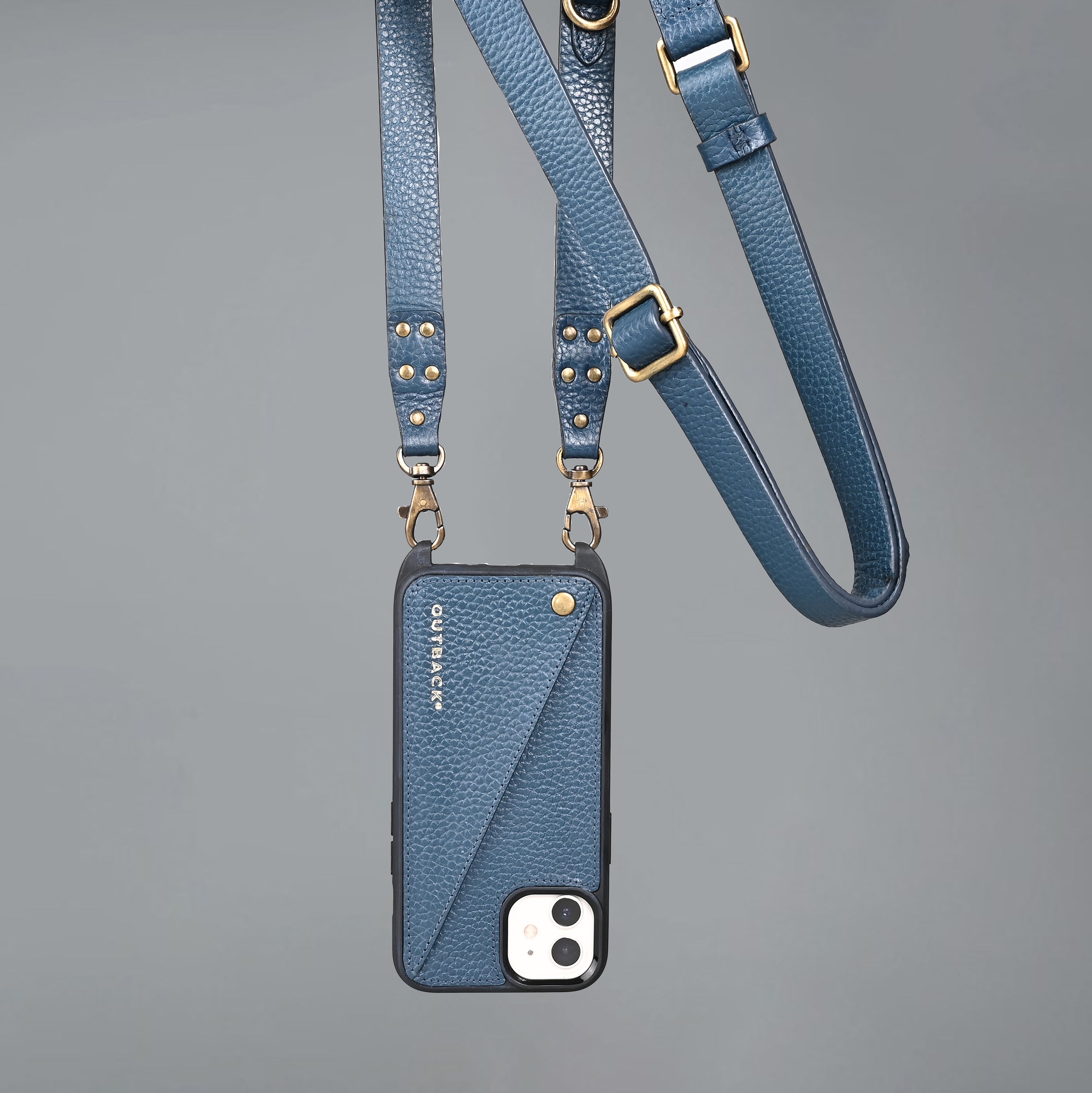 Lifestyle iPhone Case made of full grain leather with adjustable crossbody strap and external pocket for cash and cards.