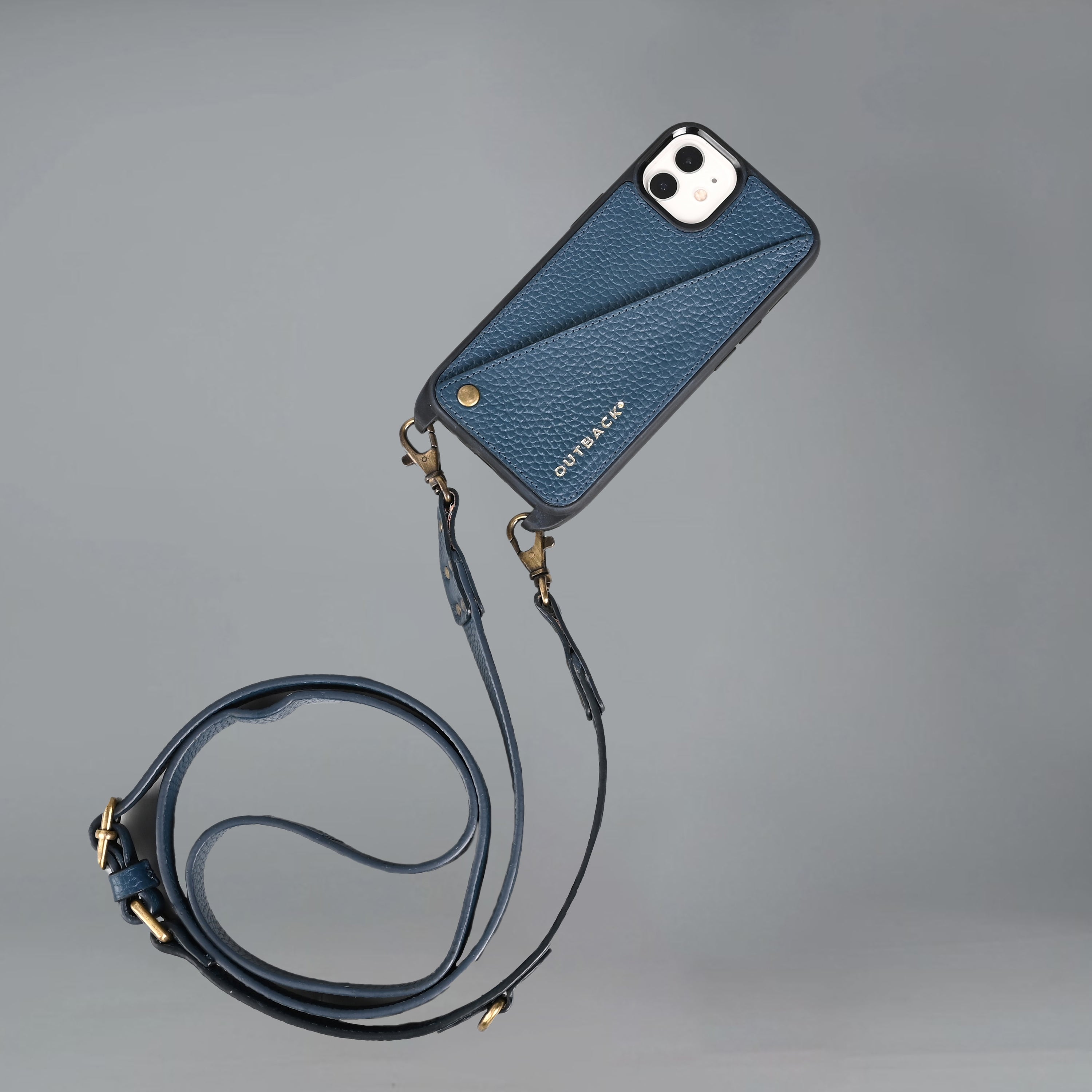 Lifestyle iPhone Case made of full grain leather with adjustable crossbody strap and external pocket for cash and cards.