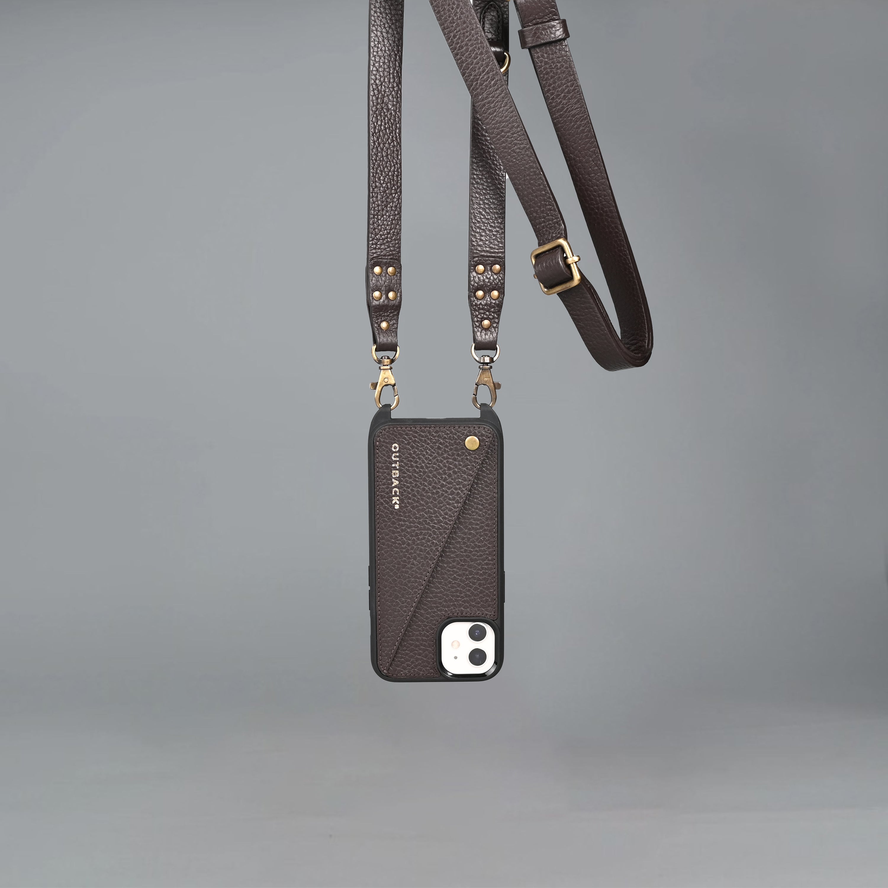 Lifestyle iPhone Case made of full grain leather with adjustable crossbody strap and external pocket for cash and cards.