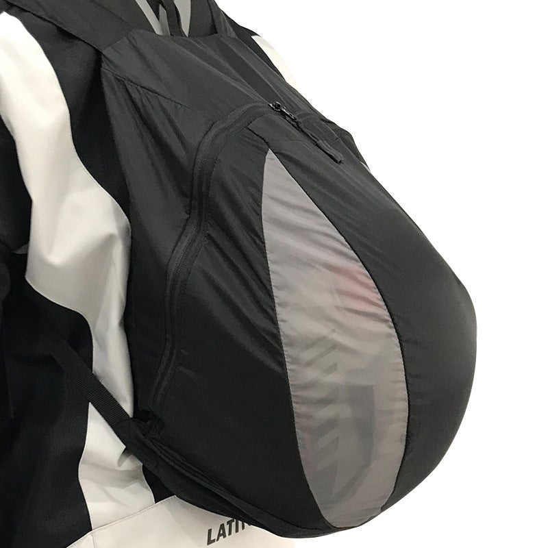 Light-weight nylon motorcycle riding helmet bag in a compact size, showcasing its durable material and versatile design for safe helmet storage.