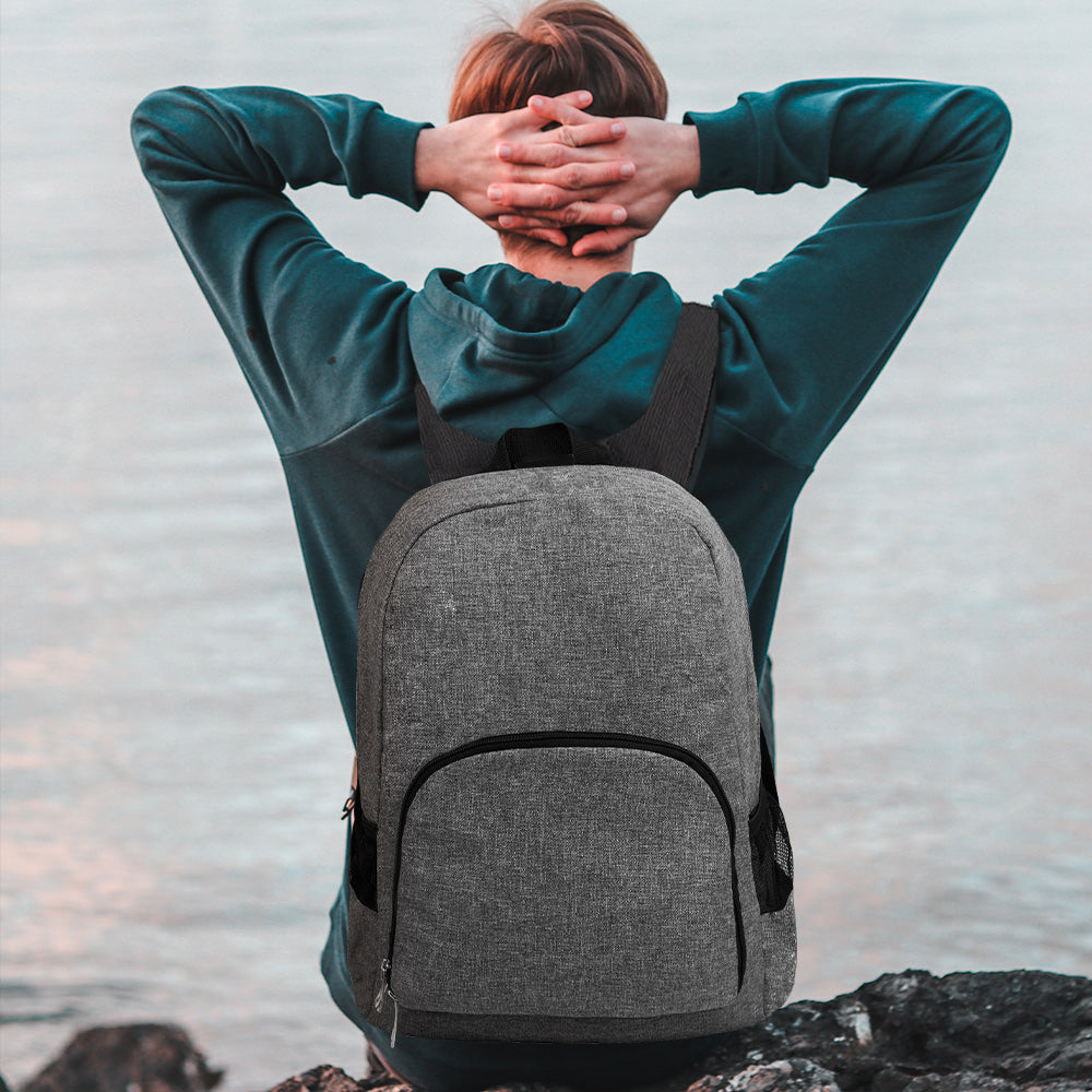 Lightweight Portable Foldable Backpack in a vibrant color, showcasing its compact design and waterproof material, ideal for outdoor activities.