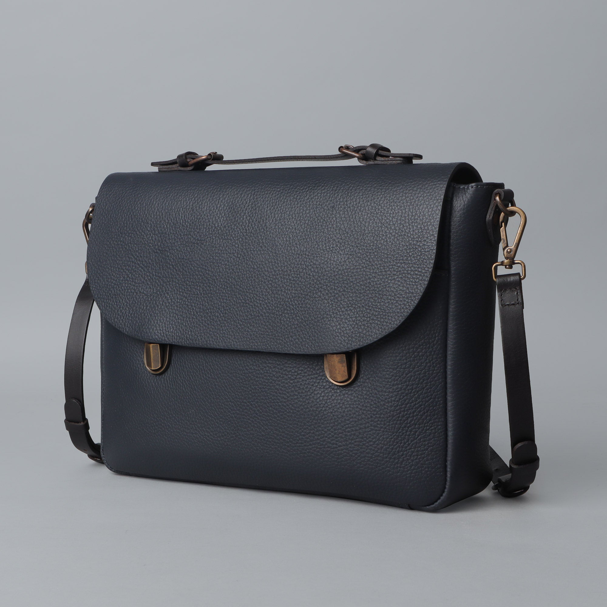 London Leather Briefcase showcasing premium full grain leather, spacious compartments, and elegant design.
