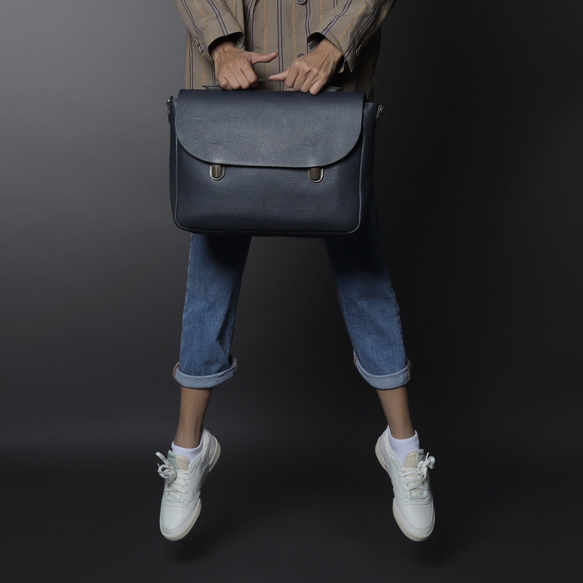 London Leather Briefcase showcasing premium full grain leather, spacious compartments, and elegant design.