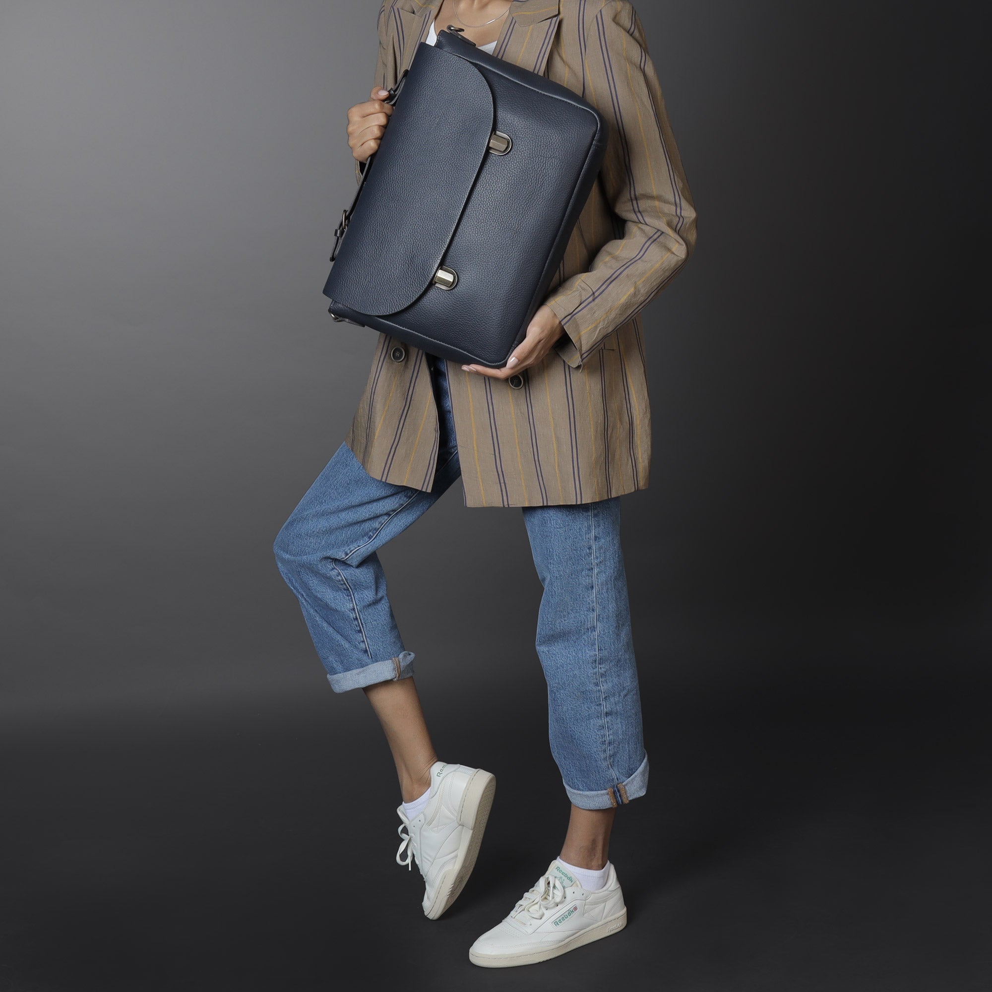 London Leather Briefcase showcasing premium full grain leather, spacious compartments, and elegant design.