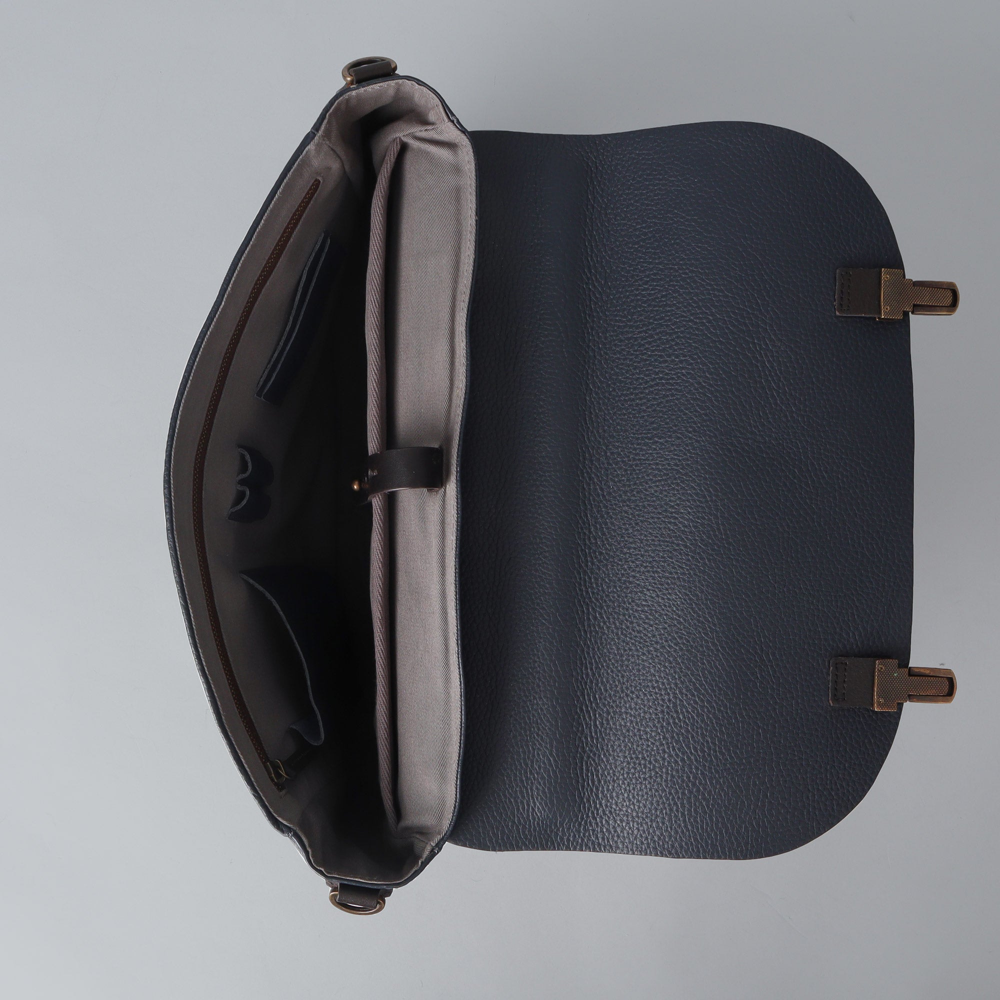 London Leather Briefcase showcasing premium full grain leather, spacious compartments, and elegant design.