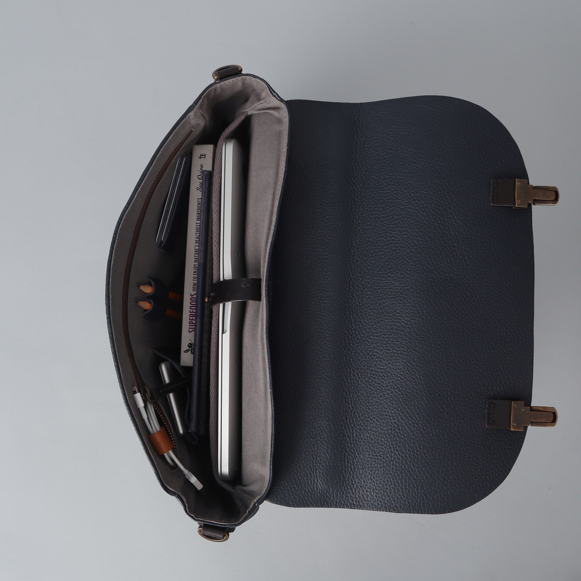 London Leather Briefcase showcasing premium full grain leather, spacious compartments, and elegant design.