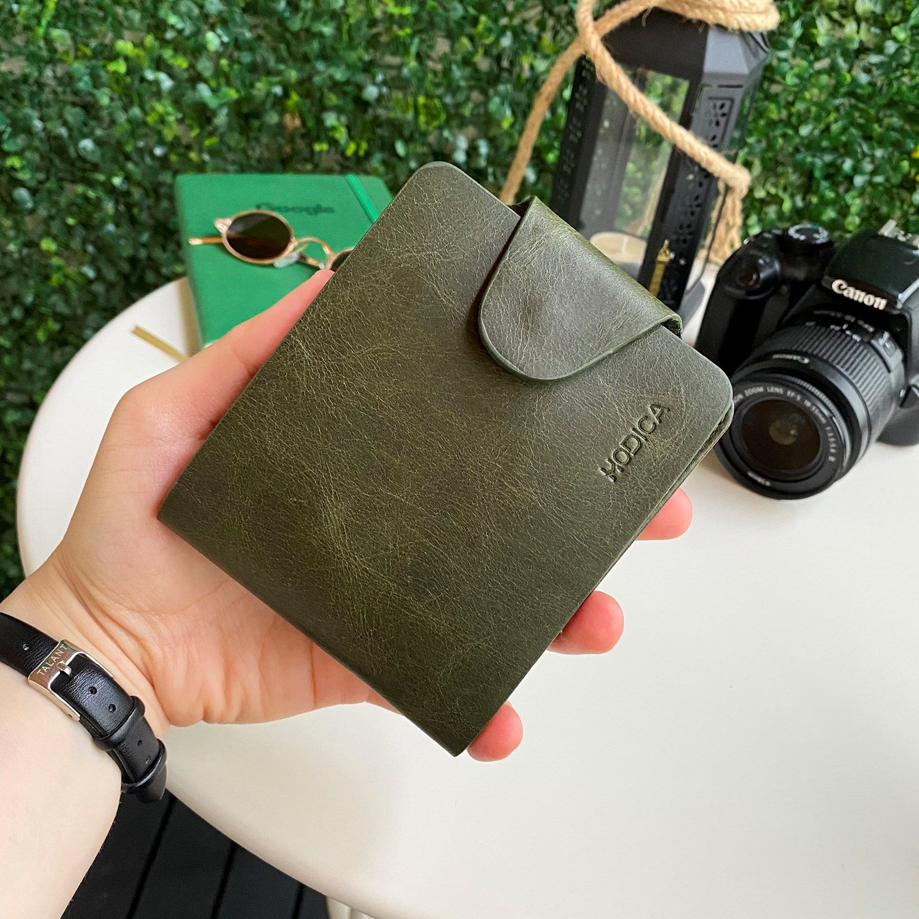 Modica Malibu Genuine Leather Snap Wallet showcasing premium leather, snap closure, and multiple compartments for cards and cash.