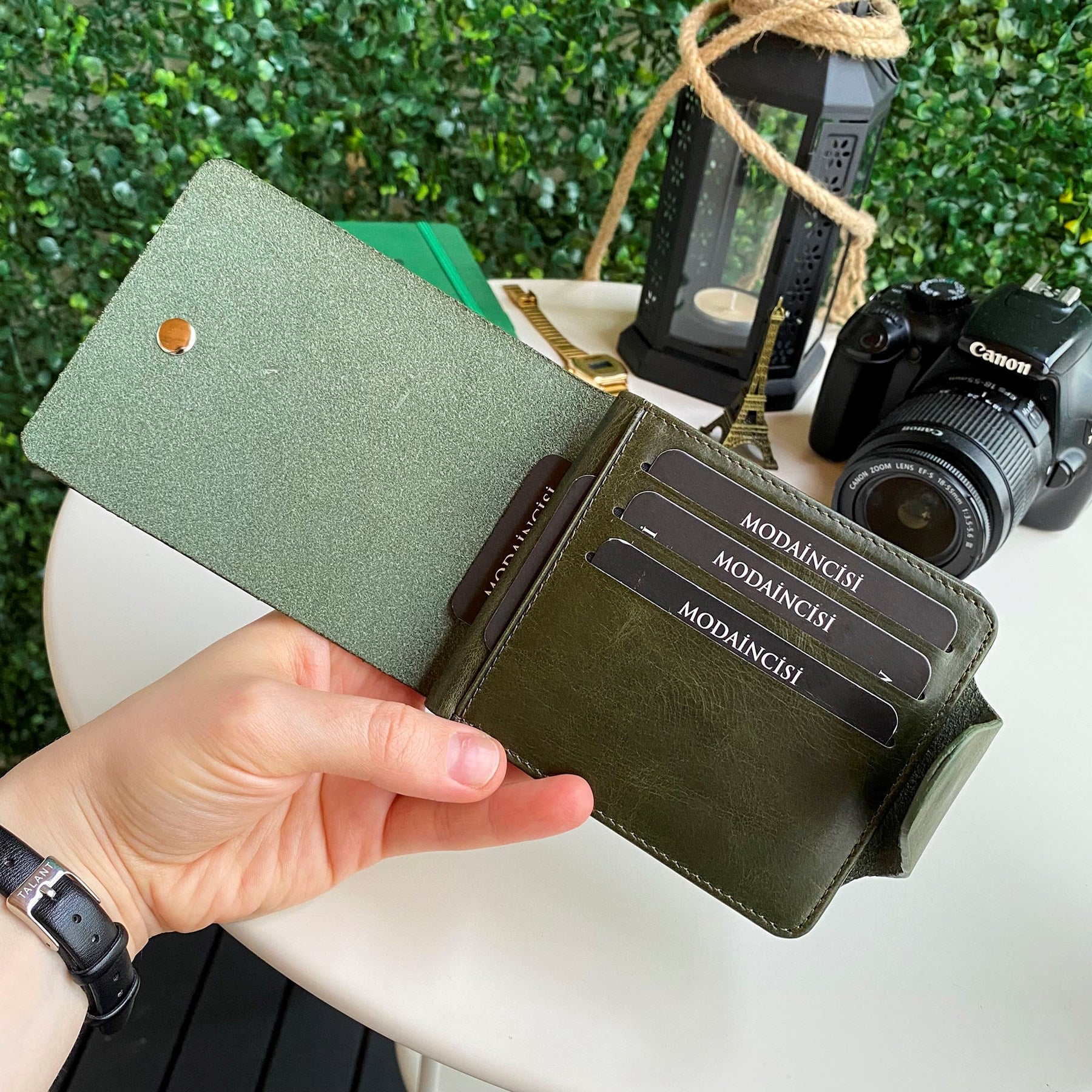 Modica Malibu Genuine Leather Snap Wallet showcasing premium leather, snap closure, and multiple compartments for cards and cash.