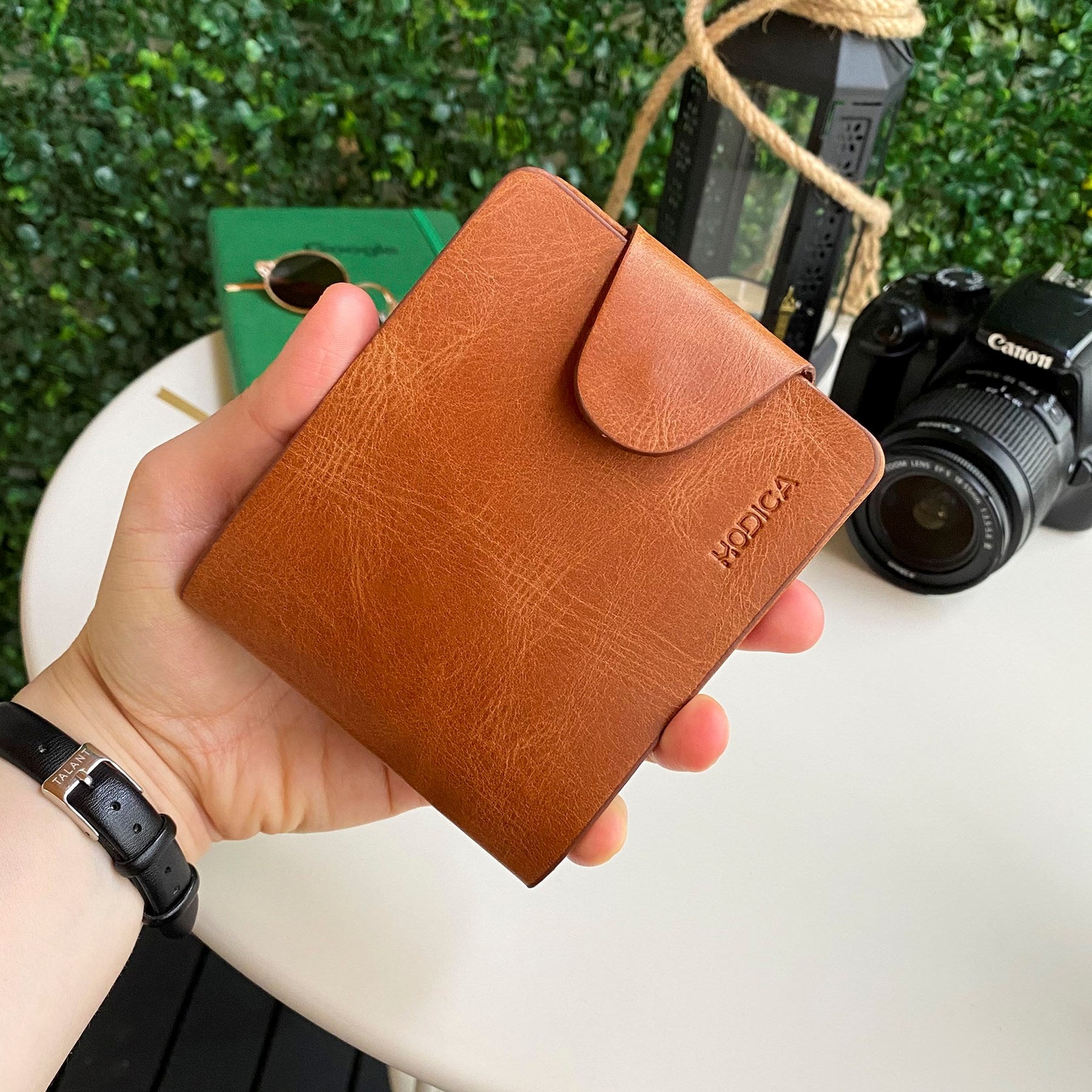 Modica Malibu Genuine Leather Snap Wallet showcasing premium leather, snap closure, and multiple compartments for cards and cash.