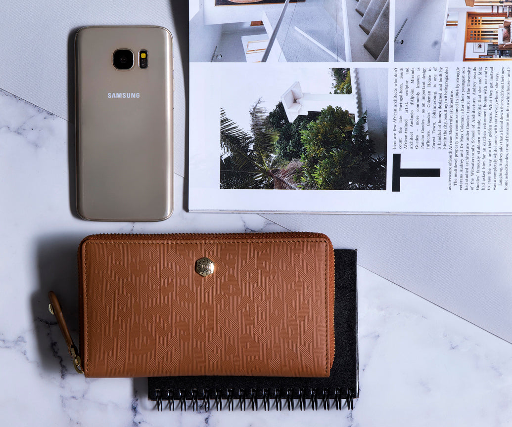 Medium Zip Around Purse in Natural with exclusive Italian prints, showcasing a stylish and compact design.