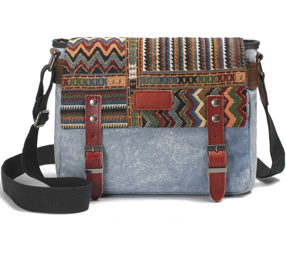 Men's Ethnic Style Canvas Messenger Bag in a cross-section square shape with a matte finish, featuring a magnetic buckle and multiple internal pockets.