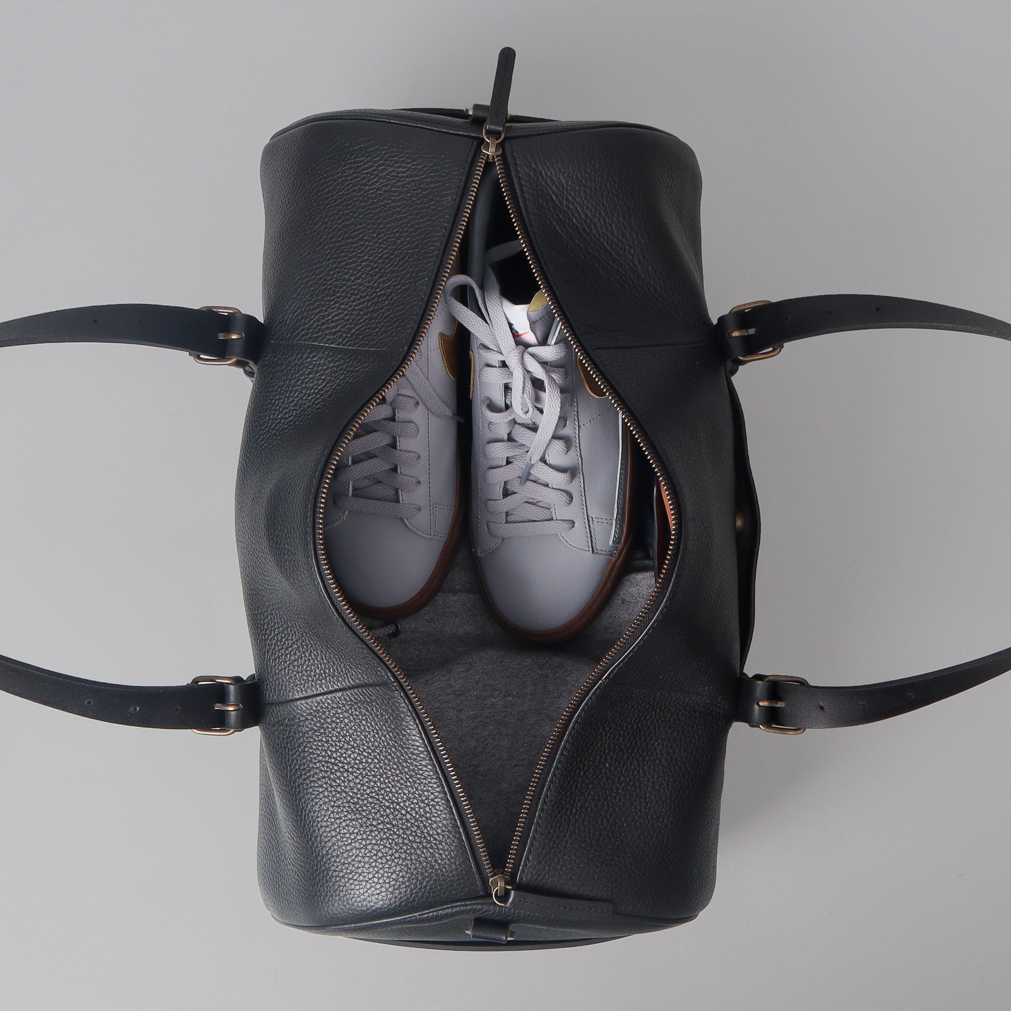 Miami Leather Gym Bag showcasing premium full grain leather, spacious design, and antique brass hardware.