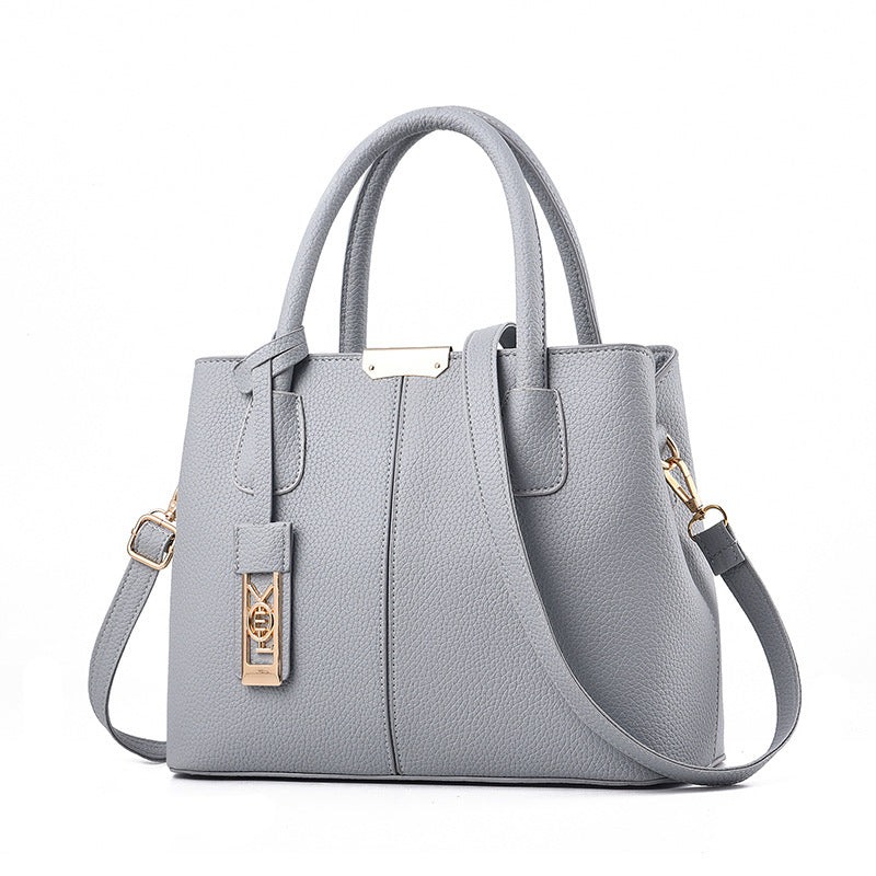 Middle-Aged Pure Color Fashion Messenger Bag in a sleek design, featuring a zipper closure and multiple pockets for organization.