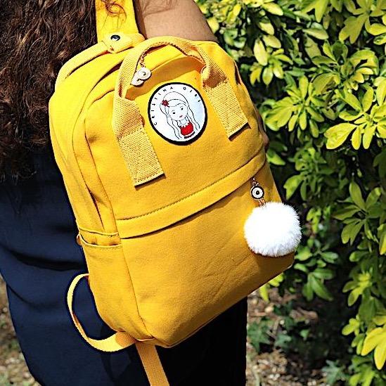 A stylish Mini Backpack in five colors with zipped pockets and adjustable straps, perfect for everyday use.