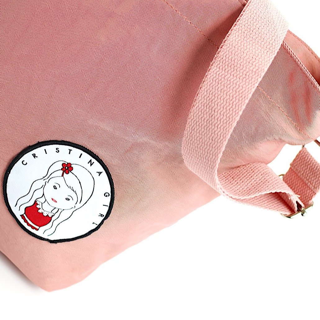 Mini Grab Bag in six vibrant colours, showcasing its soft nylon material and versatile design.