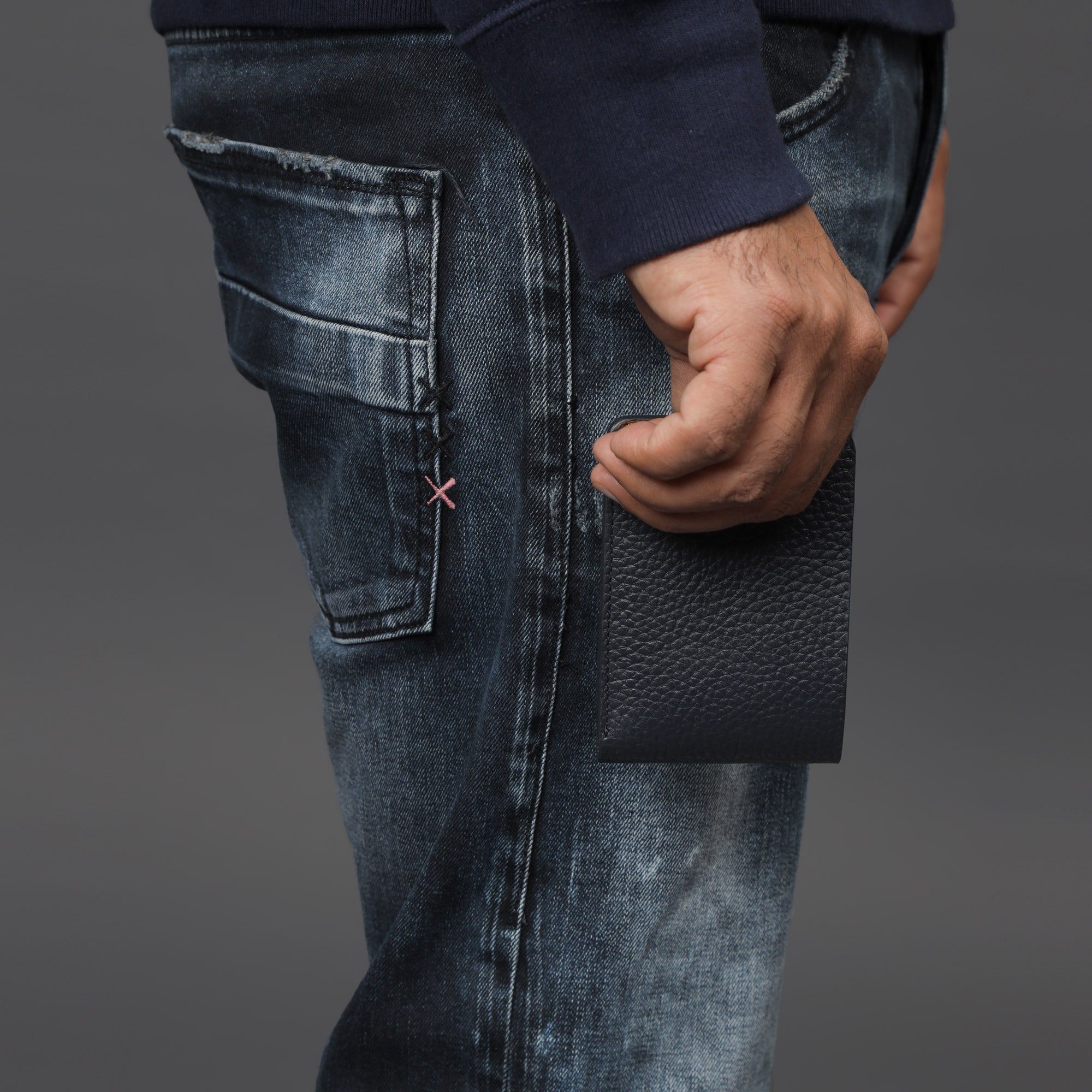 A sleek Minimal Wallet made of premium genuine leather, featuring multiple pockets for cards and cash, displayed on a neutral background.