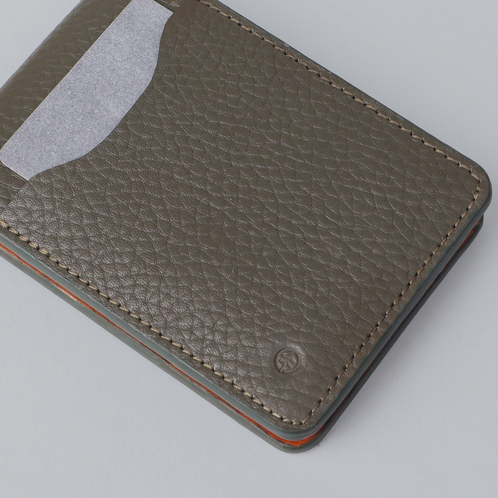 A sleek Minimal Wallet made from premium genuine leather, featuring multiple card slots and a compact design, ideal for everyday use.