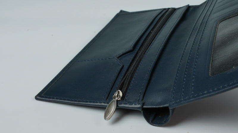 Multi Purpose Leather Long Wallet in blue, featuring multiple card slots, a zipper pocket, and made from natural cow leather.
