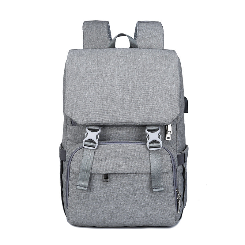 Multifunctional Large Capacity Diaper Bag for Mommy in stylish design, featuring double straps and multiple pockets for organized storage.