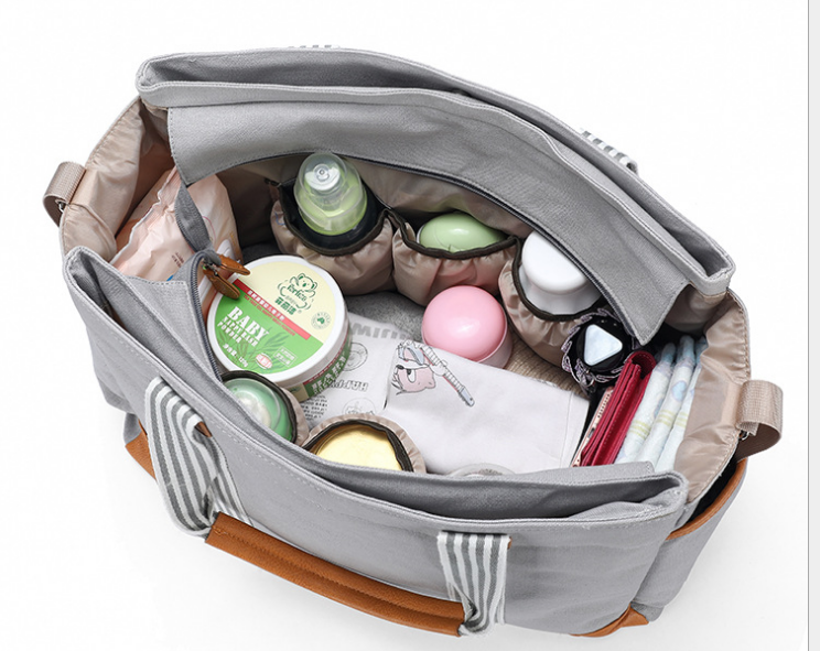 Multifunctional Large-capacity Canvas Portable Mummy Bag in stylish design, showcasing its spacious interior and durable polyester material.